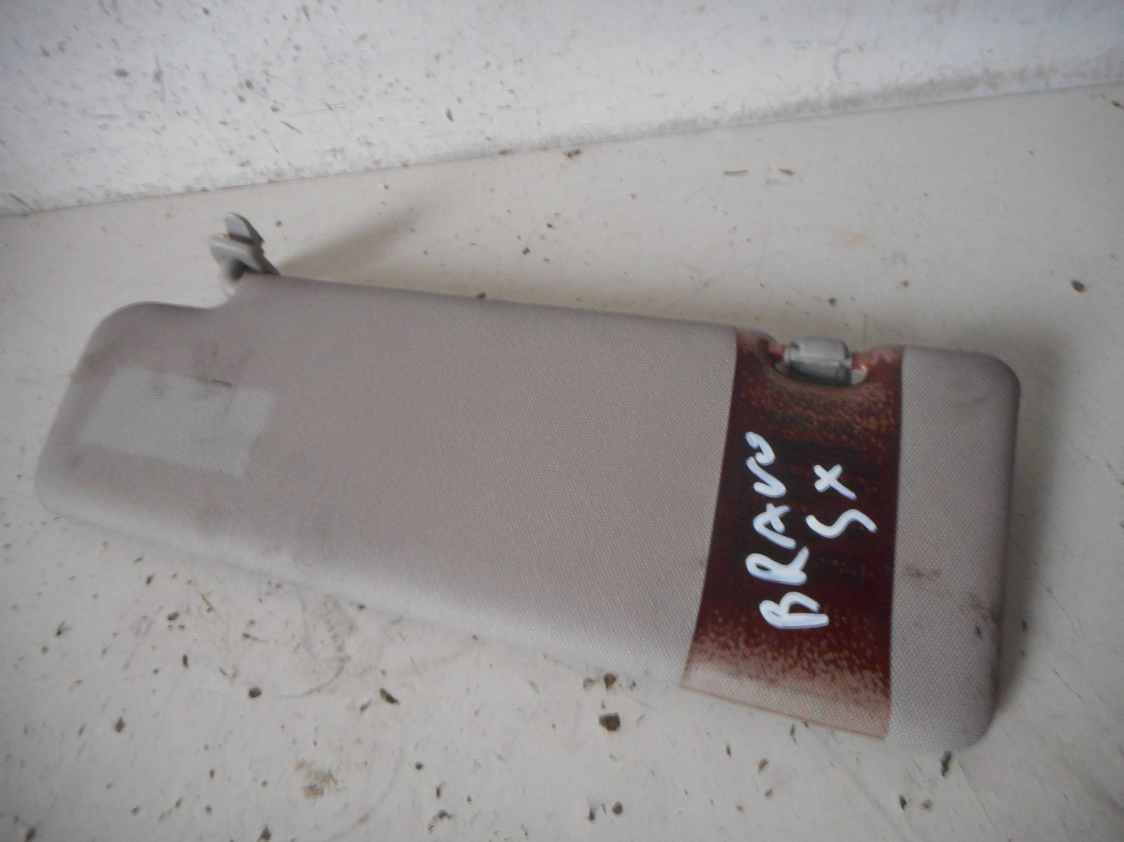 Aletta parasole parabrezza sx.